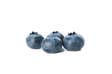 Four fresh blueberries isolated on white background
