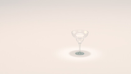 Margherita drinking glass. Empty glass on white studio backdrop.