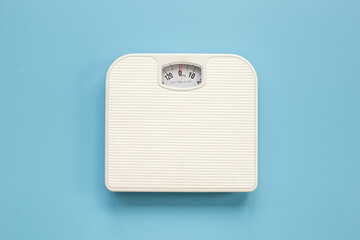 Check your body shape with white weight scales, top view