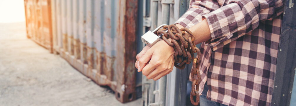 Woman trapped in cargo container wait for Human Trafficking or foreigh workers, Woman holding master key wait for holp help, woman chained to her wrist
