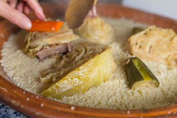 Plating a Moroccan traditional Couscous concept.