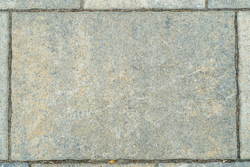 Stone street floor slab. Pattern with fine texture. Rectangular slab used for paving.
