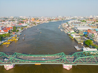 Aerial view city of Bangkok riverside with building and buddha temple