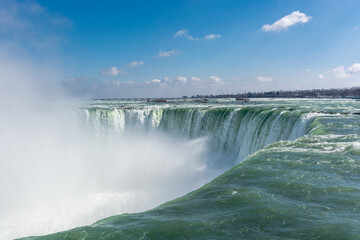 Fototapeta premium Stunning view of Niagara Falls in sunlight in Canada.