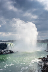 Stunning view of Niagara Falls in sunlight in Canada.