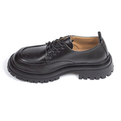 Black women's leather autumn ankle boots on a thin rubber sole with laces with low heels on a white background