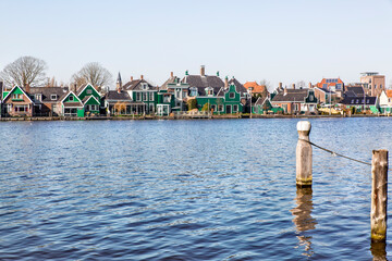 Naklejka premium amsterdam town by the river with colorful houses
