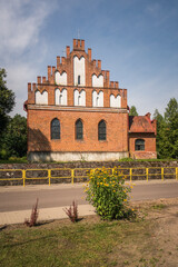 Gothic church in village Kuty, Masuria, Poland - 578351911