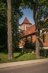 Gothic church in village Kuty, Masuria, Poland - obrazy, fototapety, plakaty