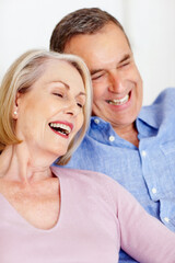 Cheerful mature couple together having fun against white. Closeup portrait of a cheerful mature couple together having fun against white.