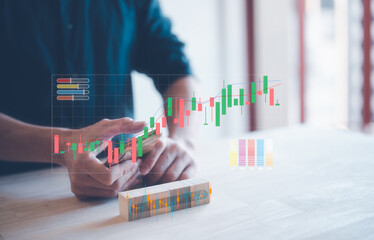 investment and saving strategy concept, man using smartphone working analysing virtual trading graph