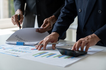 A group of Asian businessmen are brainstorming to analyze financial reporting situations. Calculate...
