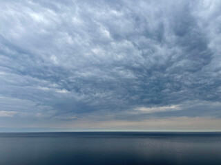 Heavy gray clouds over Baikal Lake, Russia