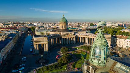 Fototapeta na wymiar Aerial view of the Nevski street and Kazan Cathedral next to House of the Singer company in the historical and at same time modern city of St. Petersburg at sunny summer 