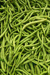 Fresh green bean on market as background. Top view. Organic texture. Local food and vegetables. Agriculture. Indonesian fresh harvest.