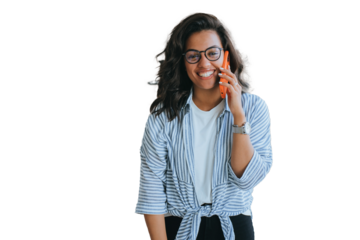 Happy African American girl in glasses, shirt and jeans talks by phone toothy smiles looks at camera excited speaks with boyfriend. Successful young female entrepreneur against transparent  background
