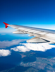 Fototapeta premium view of the wing of an airplane through the window