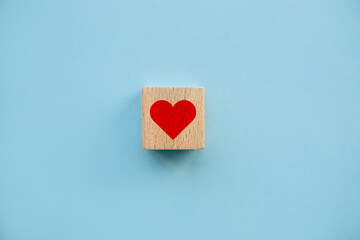 Heart shape in red wooden block