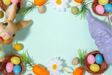 Spring's message text frame mockup with purple garden gnome, easter bunny, carrots, thin cord,...