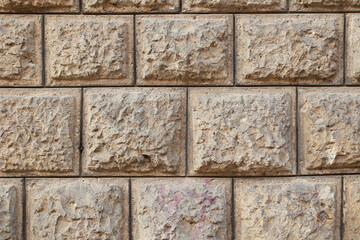 texture of a building wall with decorative tiles