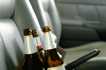 Opened beer bottles in the car.