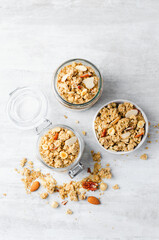 Granola with Nut Mix on Bright Concrete Background, Healthy Vegan Snack or Breakfast