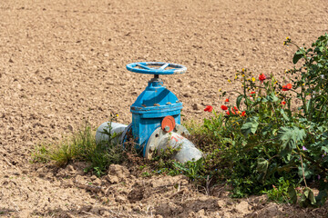 Valve with a shut-off wheel used for the control of water from subway wells for crop irrigation,...