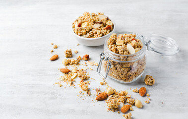 Granola with Nut Mix on Bright Concrete Background, Healthy Vegan Snack or Breakfast
