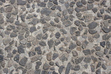 beautiful stone wall, fragment of colored stones, natural stone, beautiful background