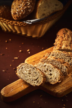 Tasty homemade bread on cutting board