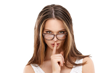 A woman in glasses signals to be quiet with a finger on her lips, or a model poses silently with a...