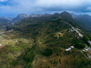 Aerial photos of Serra de Malagueta in Santiago Island Cabo Verde capture the stunning natural beauty of this mountain range, with its rugged terrain, lush vegetation, and breathtaking views