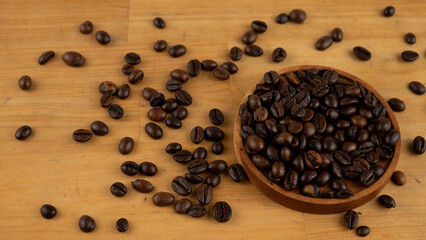 Roasted coffee bean on wooden table