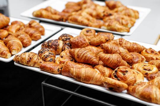 Sweet croissants with chocolate for a coffee break at an event catering.