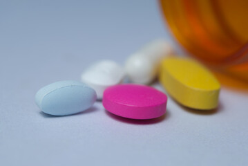 Close up of colorful pills.