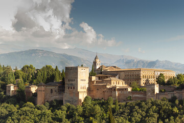 Panoramic view of the spectacular Alhambra in Granada, Andalusia, Spain, with Sierra Nevada in the background.