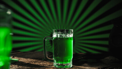 Saint Patrick day green beer background on table