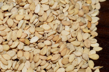 Sesame seed ( Sesamun indicum) on wooden table