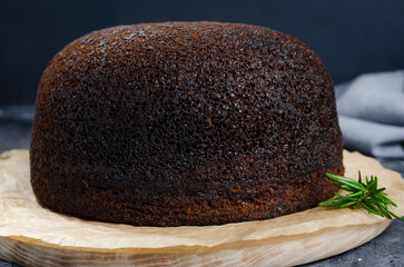 Baba Neagra, Black Baba, Traditional Moldavian Dessert on Dark Background