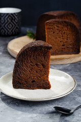 Baba Neagra, Black Baba, Traditional Moldavian Dessert on Dark Background