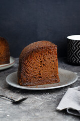 Baba Neagra, Black Baba, Traditional Moldavian Dessert on Dark Background