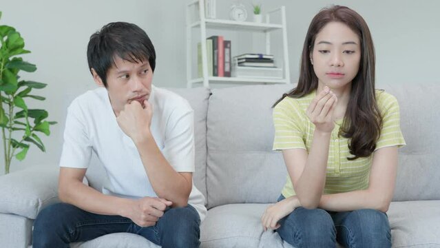 Divorce. Asian couples are desperate and disappointed after marriage. Husband and wife are sad, upset and frustrated after quarrels. distrust, love problems, betrayals. family problem, teenage love.