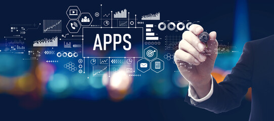 Apps theme with businessman in a city at night