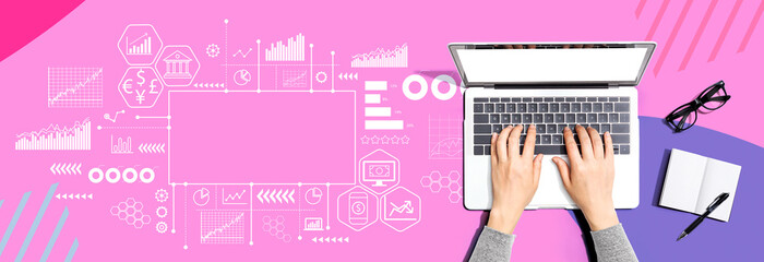 Fintech theme with person using a laptop computer