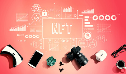NFT theme with electronic gadgets and office supplies - flat lay