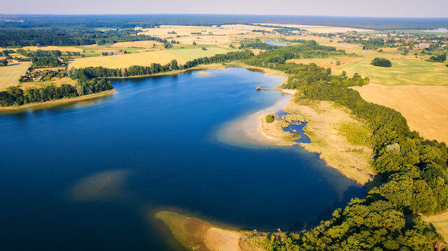 This stunning drone panorama captures a lake in Poland's Lubuskie Voivodeship on a bright and sunny spring day © Sebastian