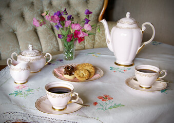 Table set for coffee with old style china