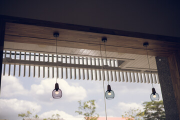 Lamp hanging in front of a coffee shop for decoration