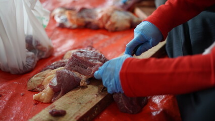 the process of cutting the sacrificial meat for each part