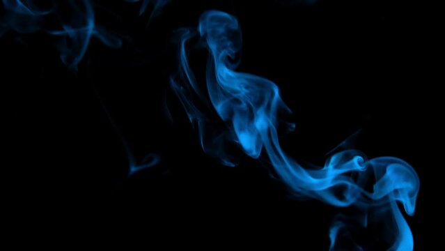 Real Blue Smoke From Incense On Black Background, Smoke Overlay In Slow Motion.